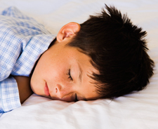 Many children see great results with chiropractic care. Boy sleeping peacefully