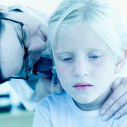 Ear infections may be common, but they're not normal. doctor checking child's ear
