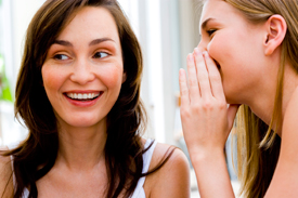 Many women with PMS symptoms turn to chiropractic care. Two women talking about chiropractic and pms relief