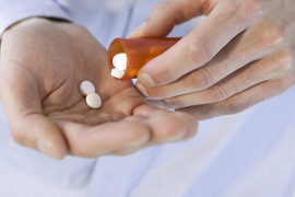 Pills can’t correct the nerve compression caused by a bulging disc. prescription pill bottle